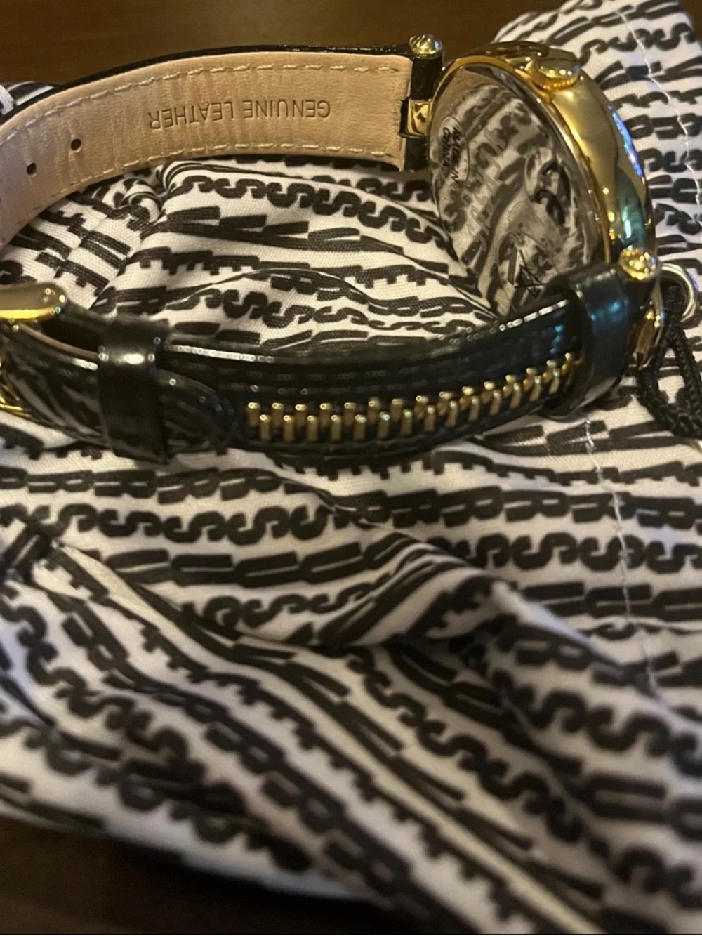 Versus Versace Black and Gold Women's Round Dial Watch with Charm Accent